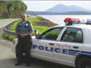 Craig Police Officer and Car at City Limits